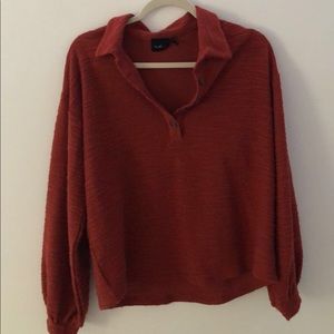 red long sleeve top